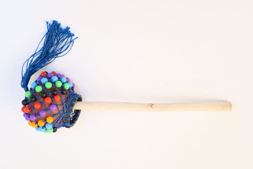 Knock on Wood Ghanaian cabassa on a stick